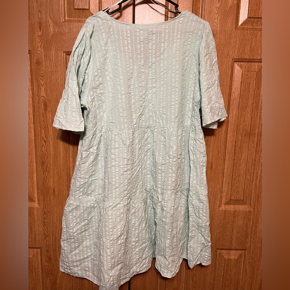 A New Day Pink Seersucker Flutter Sleeve
Babydoll Dress - Picture 2 of 3